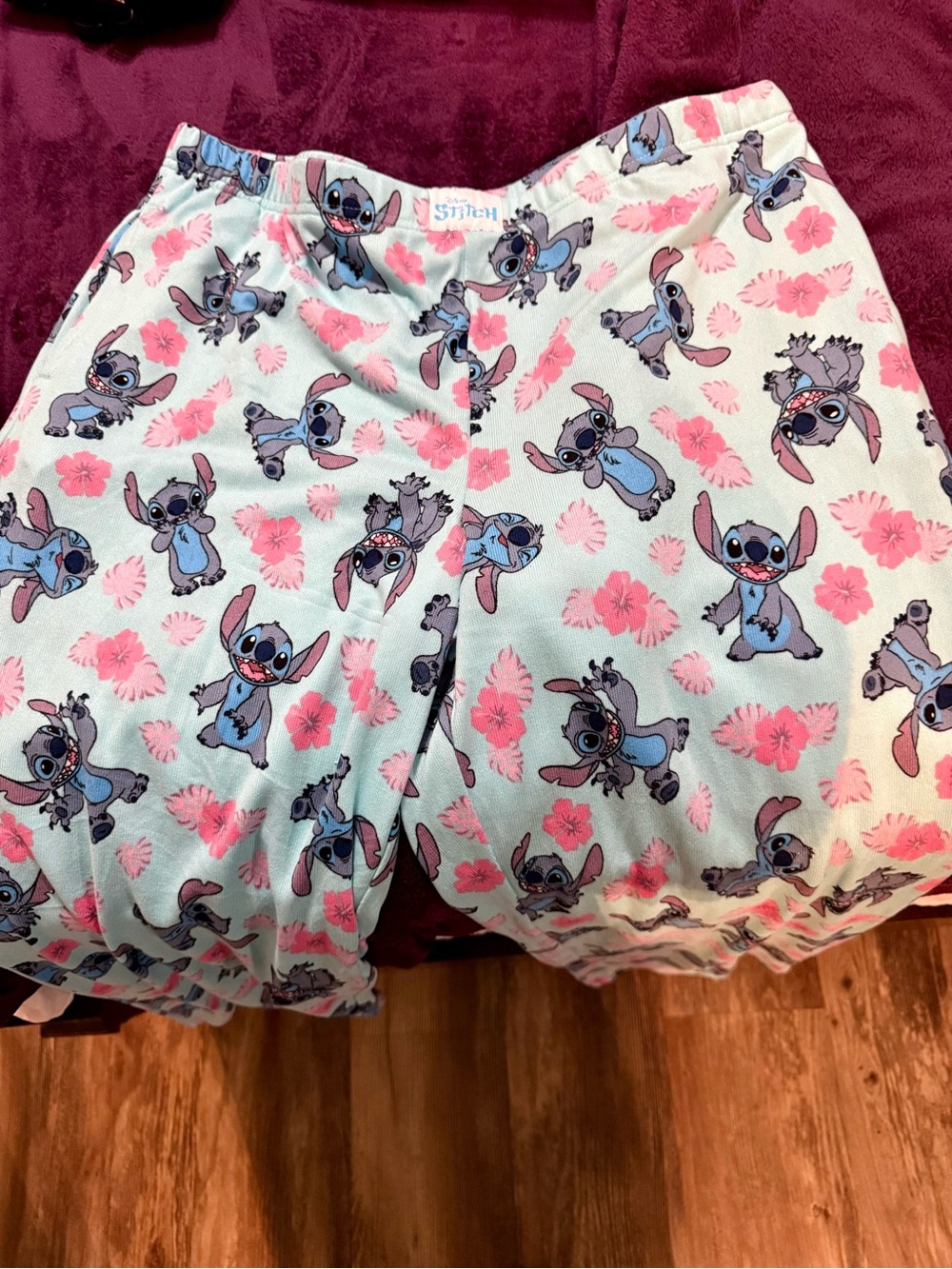 Disney Stitch Light Blue Shorts with Pink Floral Print
